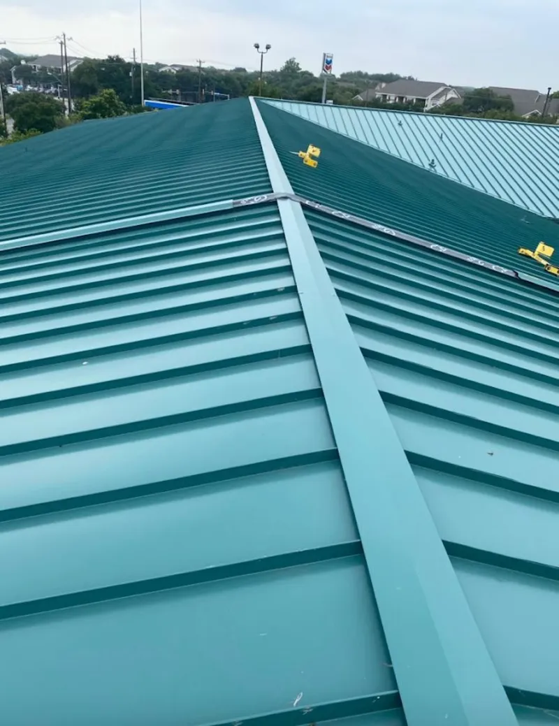 Green commercial metal roof ridge and valley for Metal Roof Repair in Adams